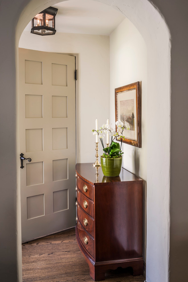 Photo of a small mediterranean foyer in Los Angeles with a single front door.