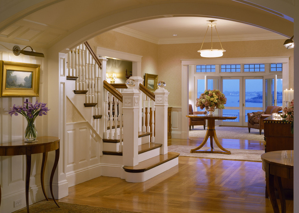 Design ideas for a large traditional foyer in Boston with medium hardwood flooring.