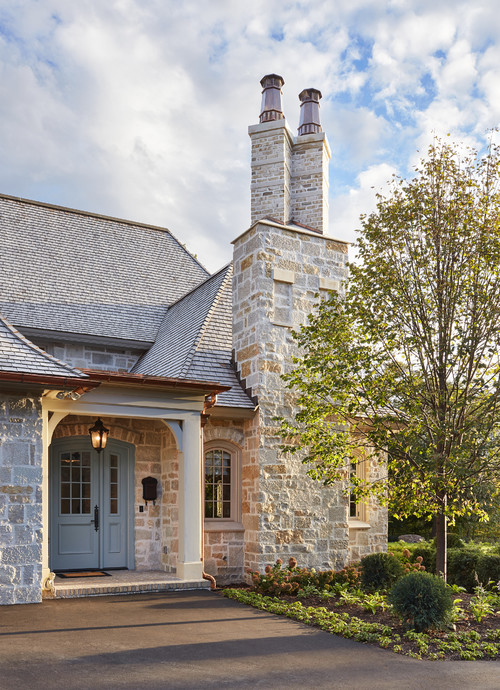 Provence inspired home with light blue side door