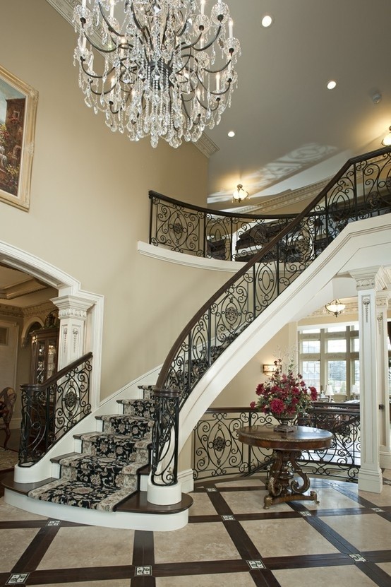 Photo of an expansive traditional foyer in Detroit with beige walls and marble flooring.