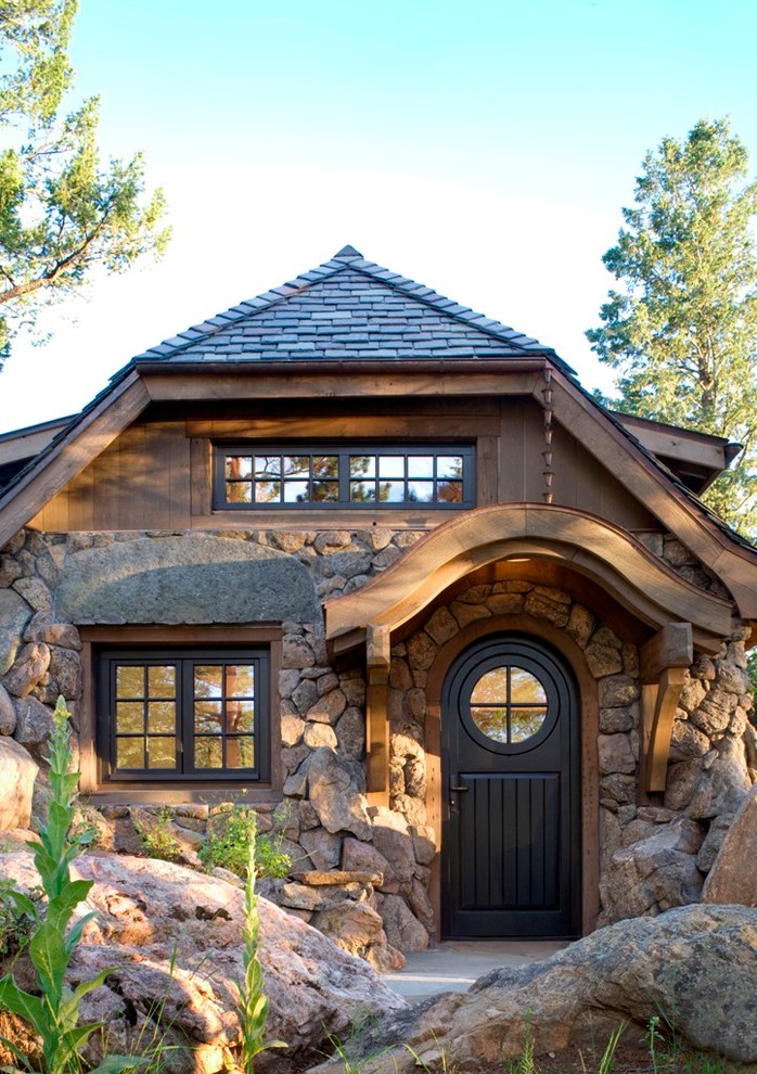 Small rustic entrance in Denver with a single front door and a black front door.