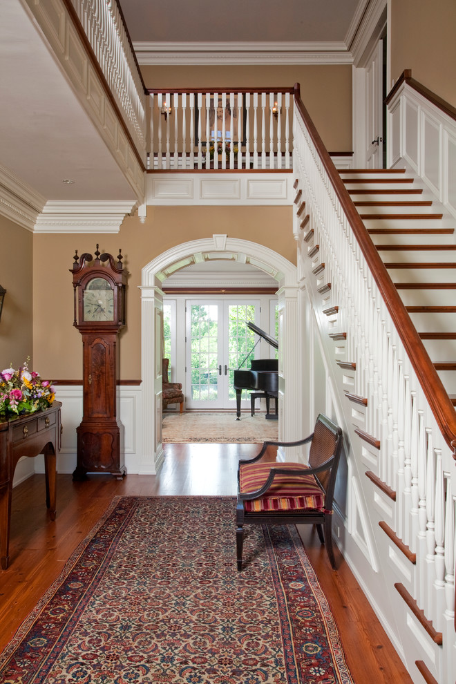 Example of a classic entryway design in Philadelphia with beige walls