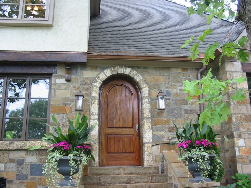 Tuscan entryway photo in Little Rock
