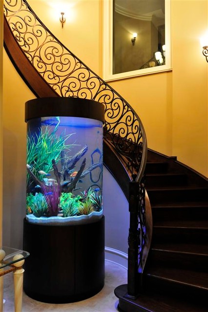 Stunning Cylinder Aquarium with Wrap Around Staircase - Mediterranean -  Staircase - Houston - by The Fish Gallery