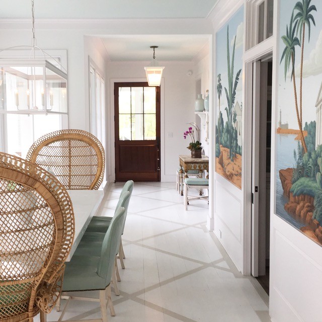 Beach style painted wood floor single front door photo in Charleston with white walls and a dark wood front door