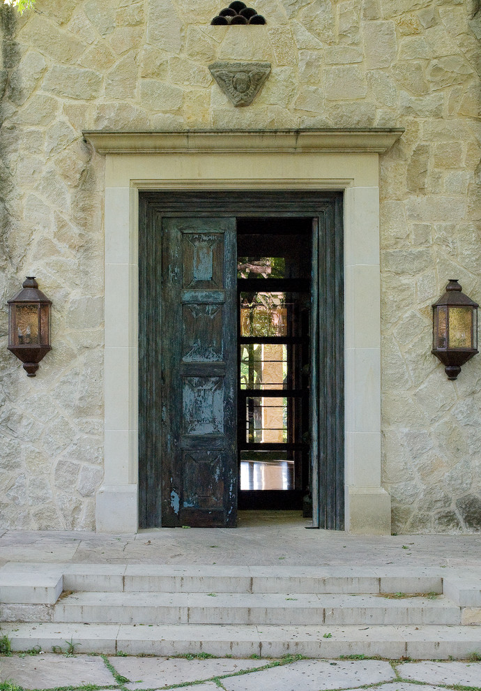 Photo of a medium sized mediterranean front door in Dallas with a double front door and a blue front door.