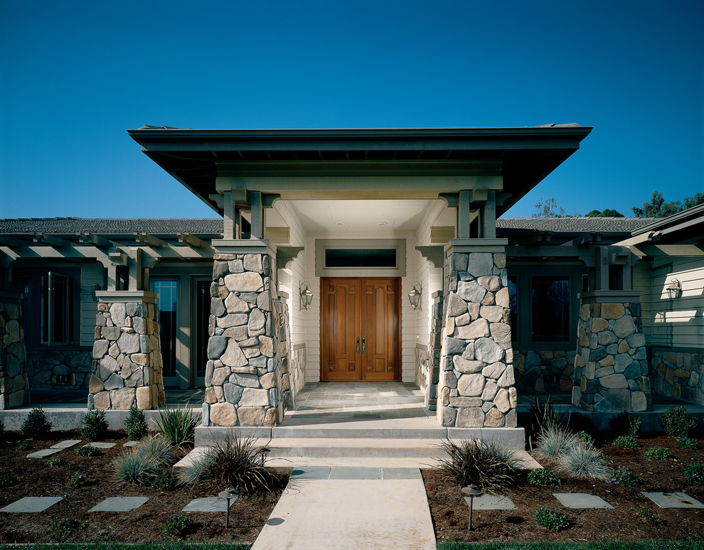 Inspiration for a craftsman entryway remodel in Charlotte