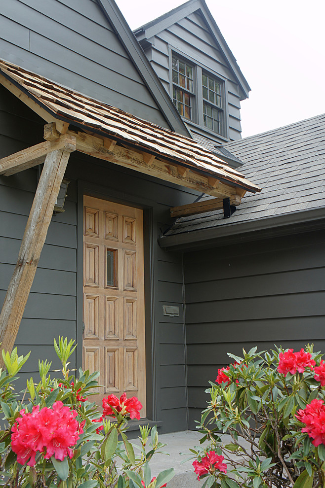 Design ideas for a medium sized eclectic front door in Portland with a single front door and a light wood front door.