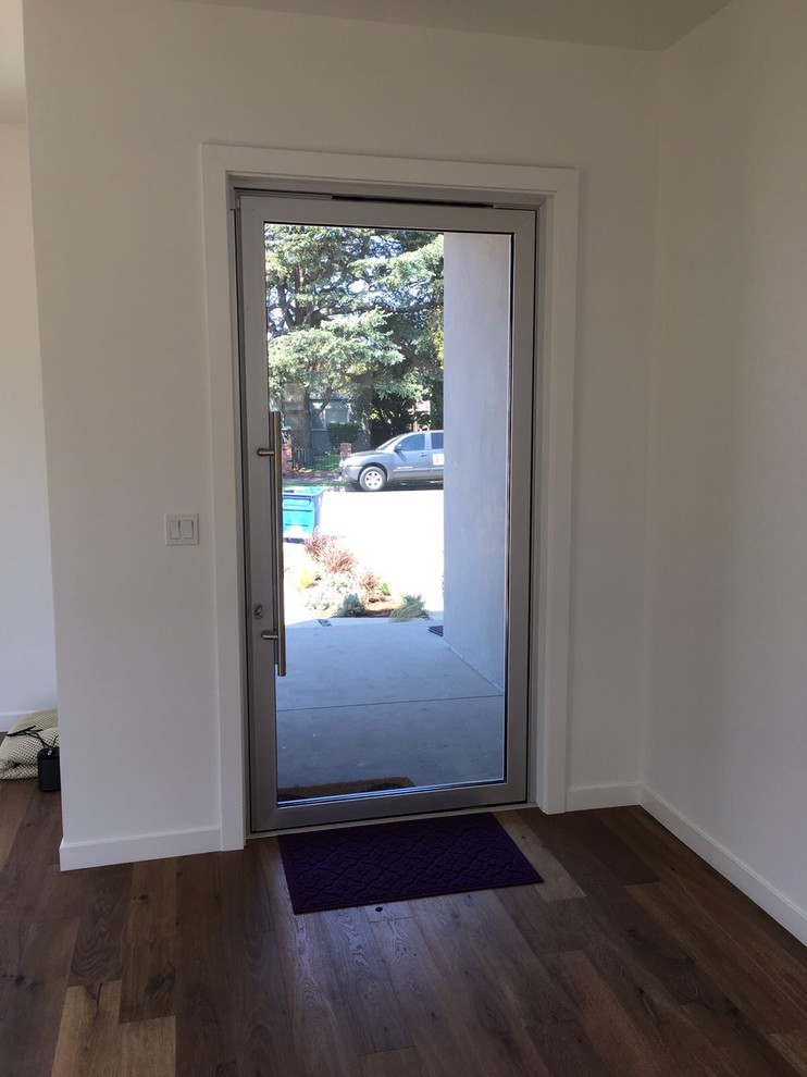 Medium sized modern front door in Los Angeles with a single front door and a glass front door.