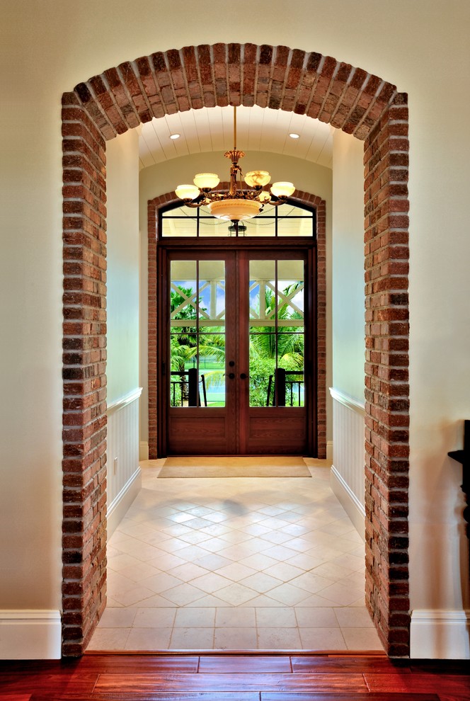 Island style entryway photo in Miami
