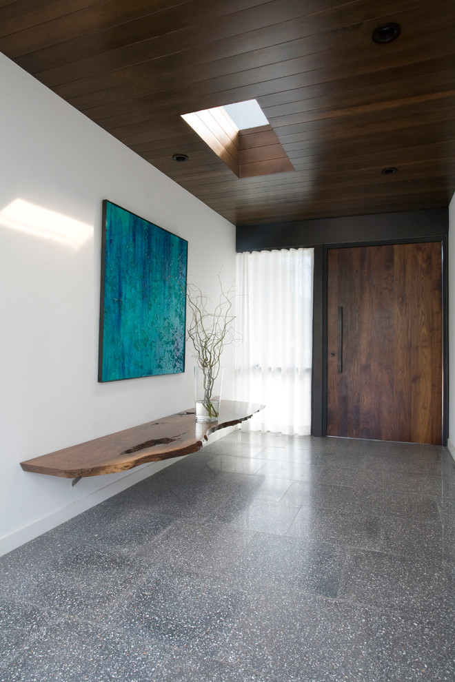 Entryway - modern concrete floor entryway idea in San Diego