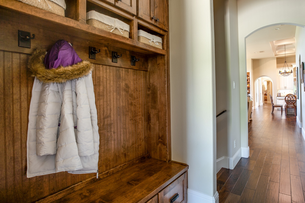 Small traditional boot room in Dallas with beige walls, dark hardwood flooring, a single front door and a dark wood front door.