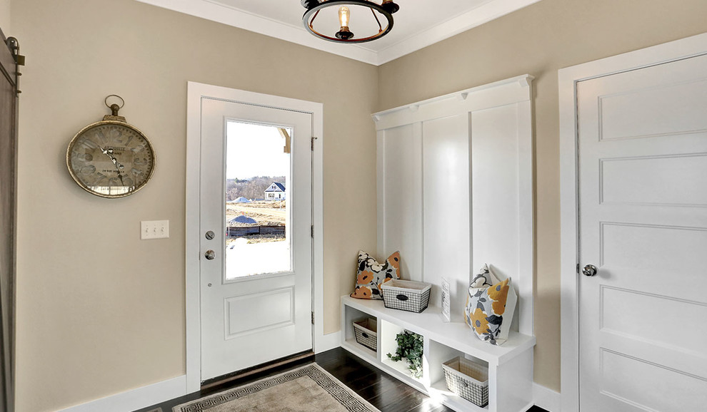 Medium sized traditional foyer in Other with beige walls, dark hardwood flooring, a single front door and a white front door.