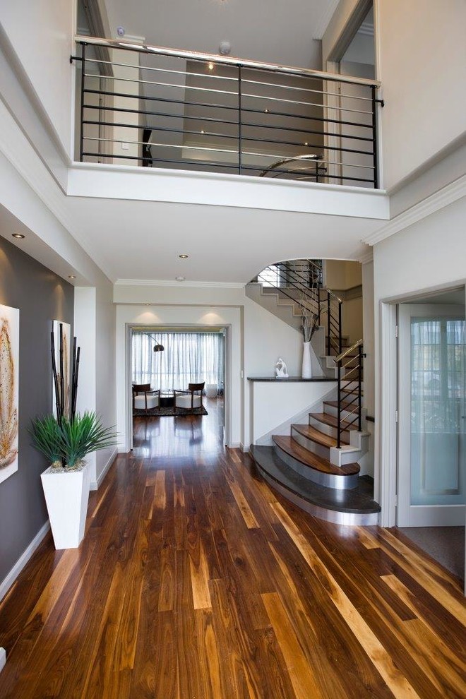 Inspiration for a medium sized modern entrance in Perth with beige walls, light hardwood flooring, a double front door, a white front door, brown floors and a drop ceiling.