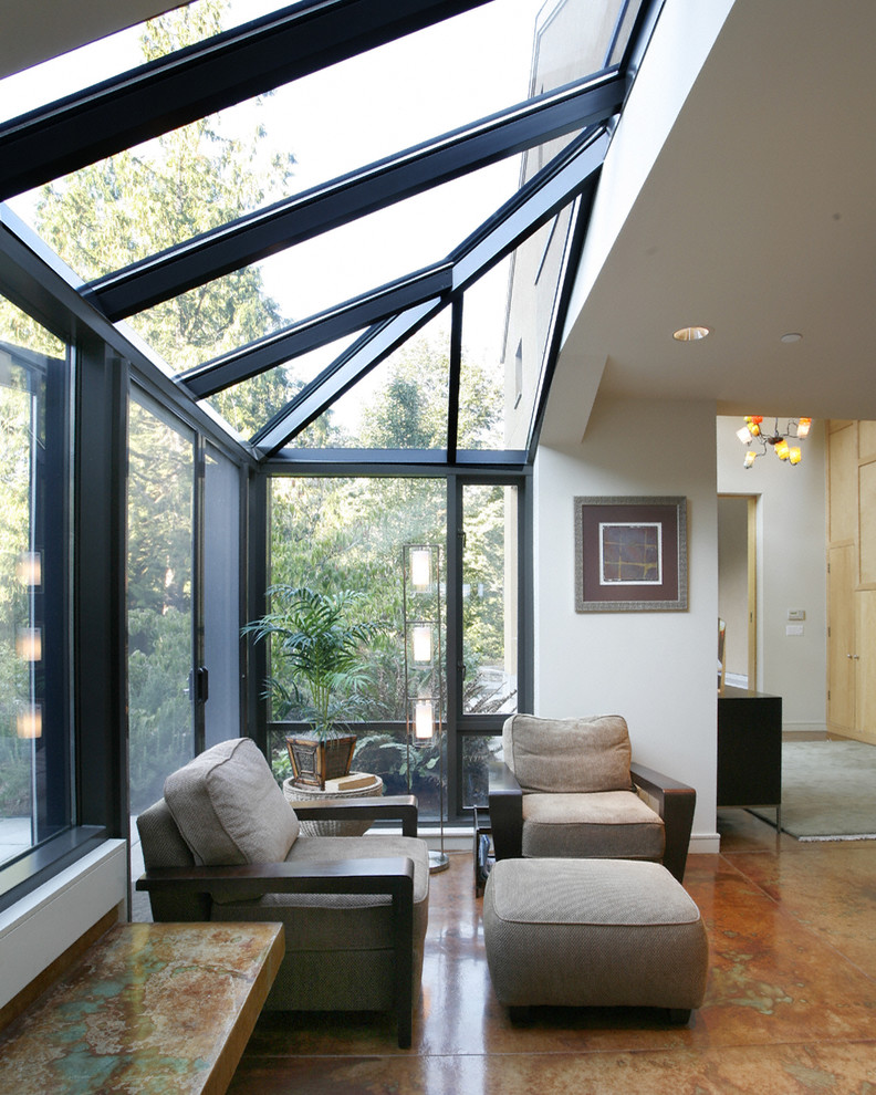 Inspiration for a contemporary porch in Seattle with white walls and concrete flooring.