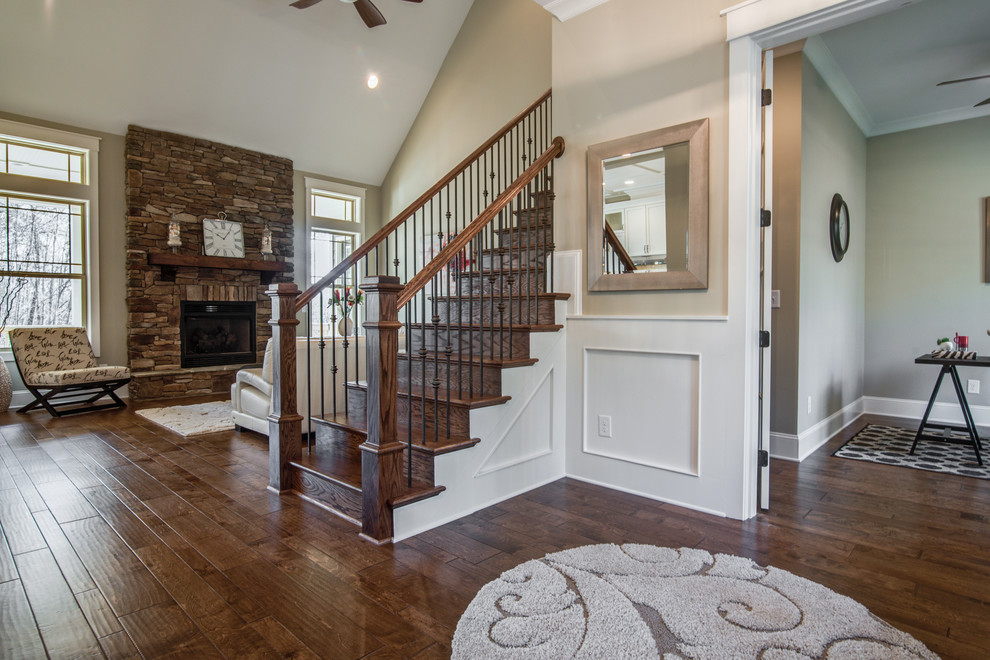 Photo of a medium sized classic foyer in Charlotte with beige walls, medium hardwood flooring and brown floors.