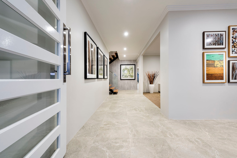 Entryway - mid-sized contemporary ceramic tile entryway idea in Perth with white walls and a white front door
