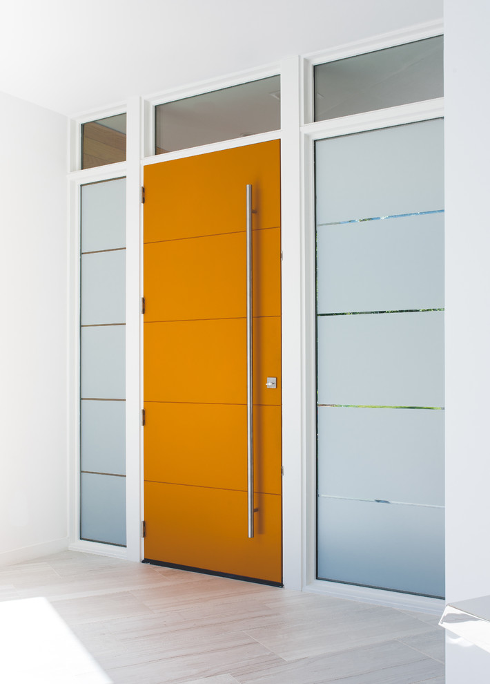 Inspiration for a mid-sized modern light wood floor and gray floor entryway remodel in Dallas with white walls and an orange front door