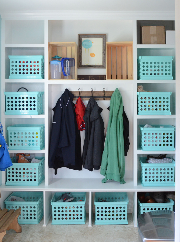 Mudroom - mid-sized transitional mudroom idea in Columbus with white walls