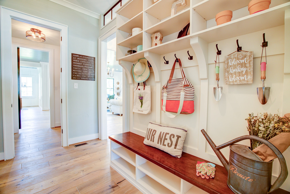 Inspiration for a mid-sized cottage light wood floor and brown floor entryway remodel in Richmond with gray walls