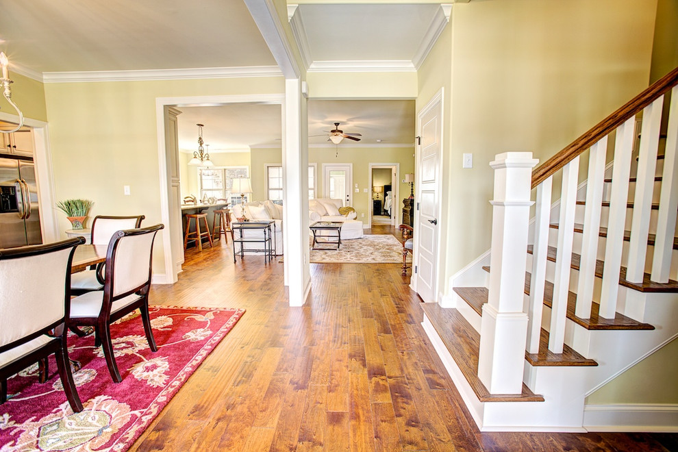 Classic entrance in Other with medium hardwood flooring.