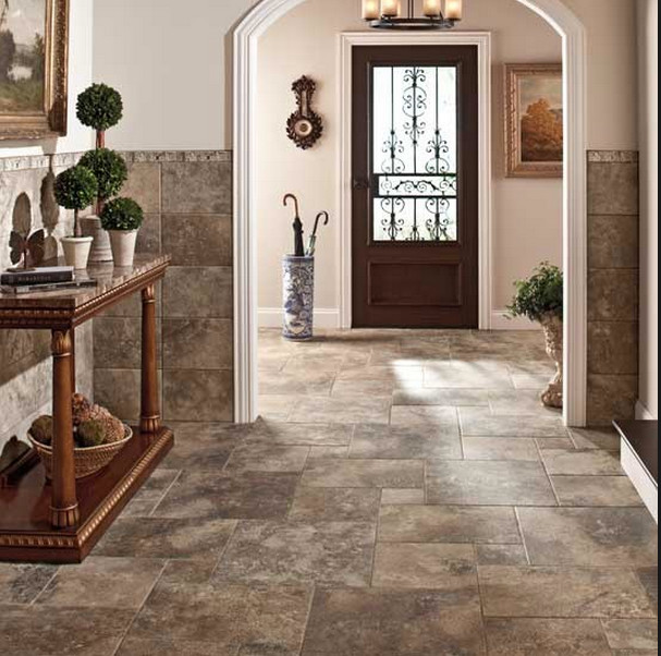 Entryway - mid-sized traditional ceramic tile entryway idea in Cleveland with beige walls and a dark wood front door