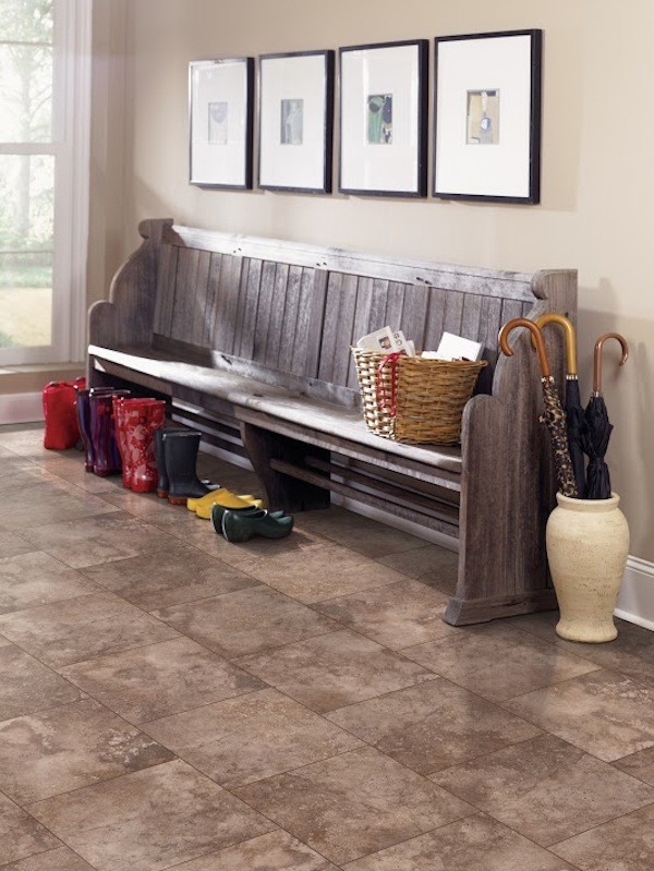 Inspiration for a rustic boot room in Indianapolis with beige walls and ceramic flooring.
