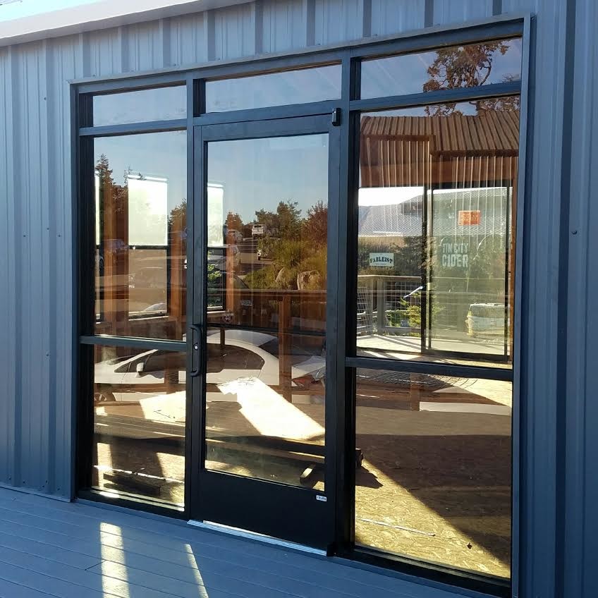 Small urban front door in San Luis Obispo with a single front door and a glass front door.