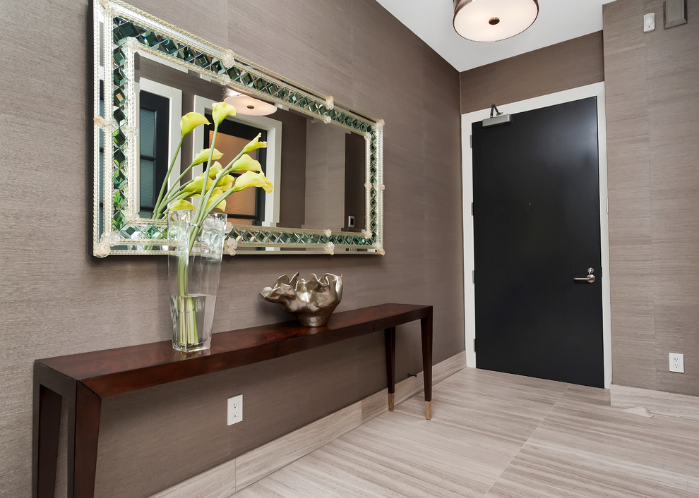 This is an example of a medium sized classic foyer in Denver with grey walls, limestone flooring, a single front door and a black front door.