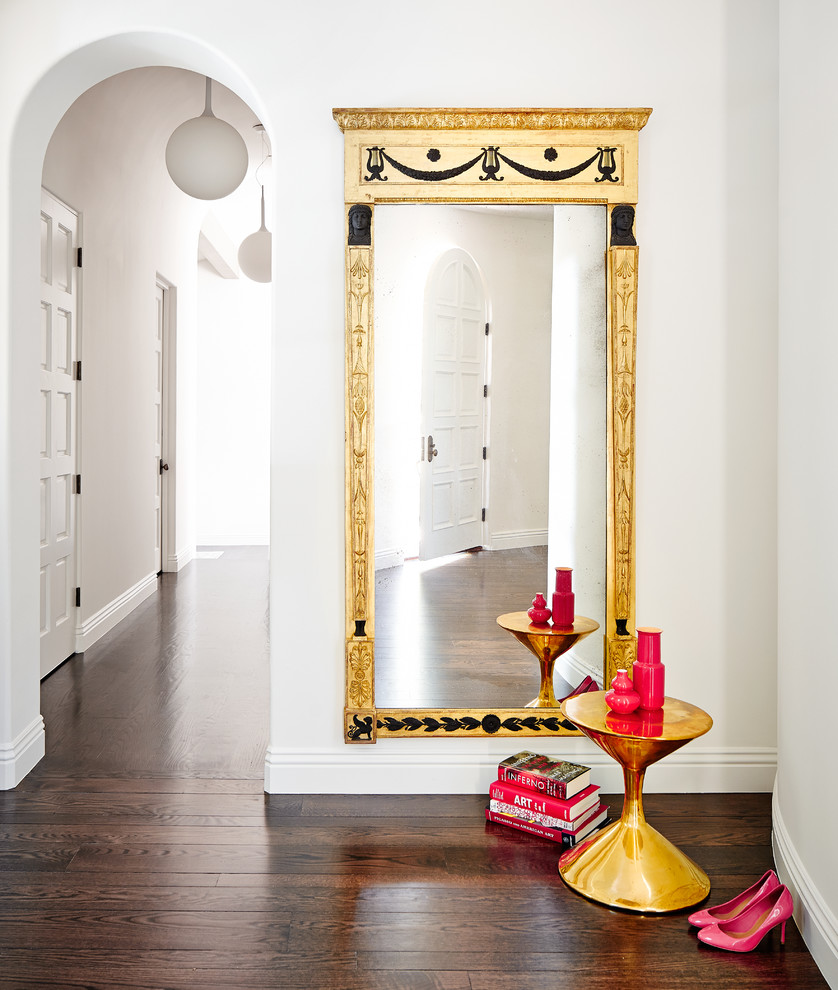 Medium sized traditional foyer in San Francisco with white walls, dark hardwood flooring and a white front door.