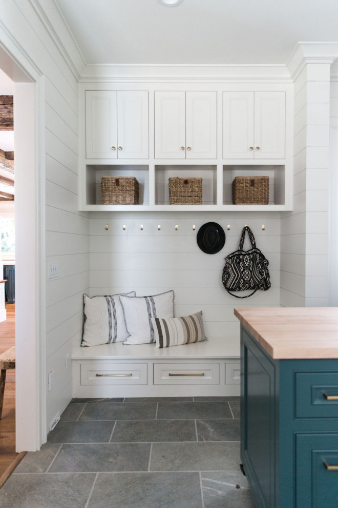 Mudroom - traditional gray floor and shiplap wall mudroom idea in Other with white walls