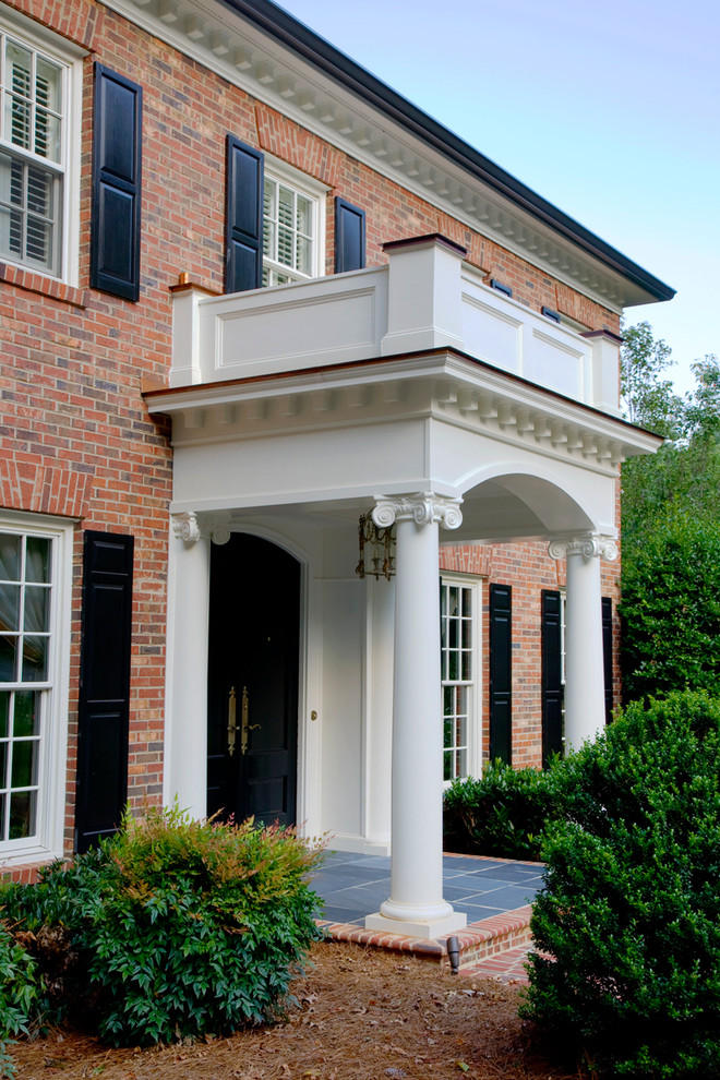 Photo of a traditional porch in Charlotte with a double front door and a black front door.