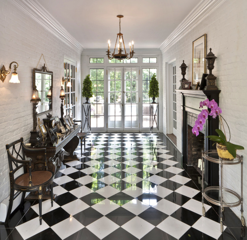 Entryway - traditional marble floor and multicolored floor entryway idea in Other