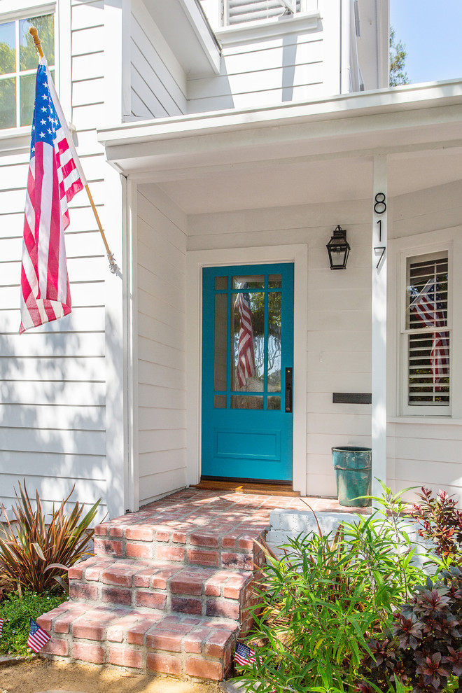 Inspiration för en vintage entré, med en enkeldörr och en blå dörr