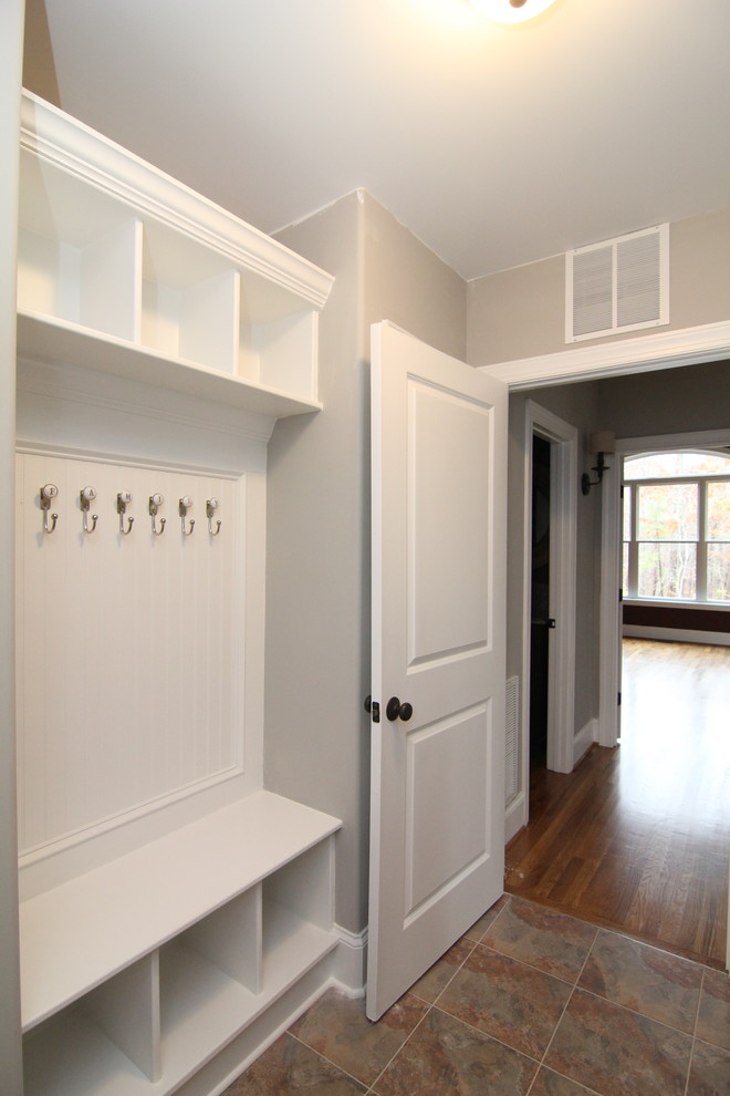 Photo of a medium sized classic entrance in Raleigh with grey walls and ceramic flooring.