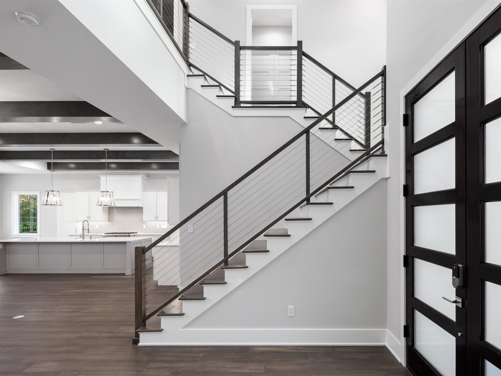 This is an example of a medium sized traditional staircase in Orlando.