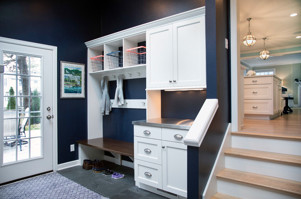 Mudroom - mid-sized transitional slate floor and black floor mudroom idea in Other with blue walls