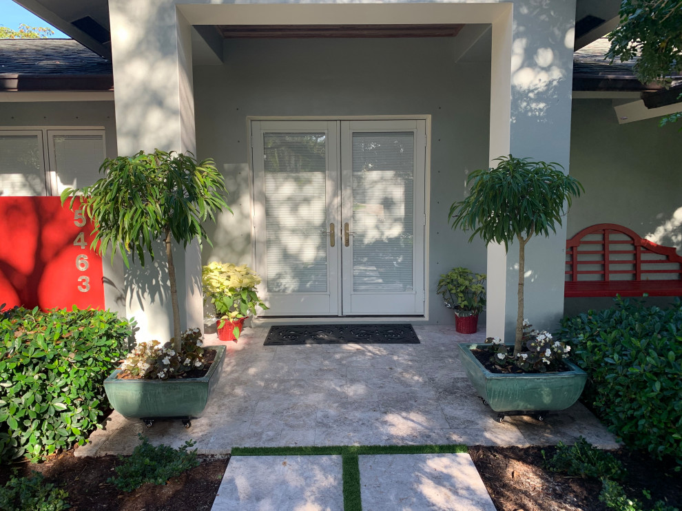 Small traditional front door in Miami with grey walls, marble flooring, a double front door, a white front door and grey floors.