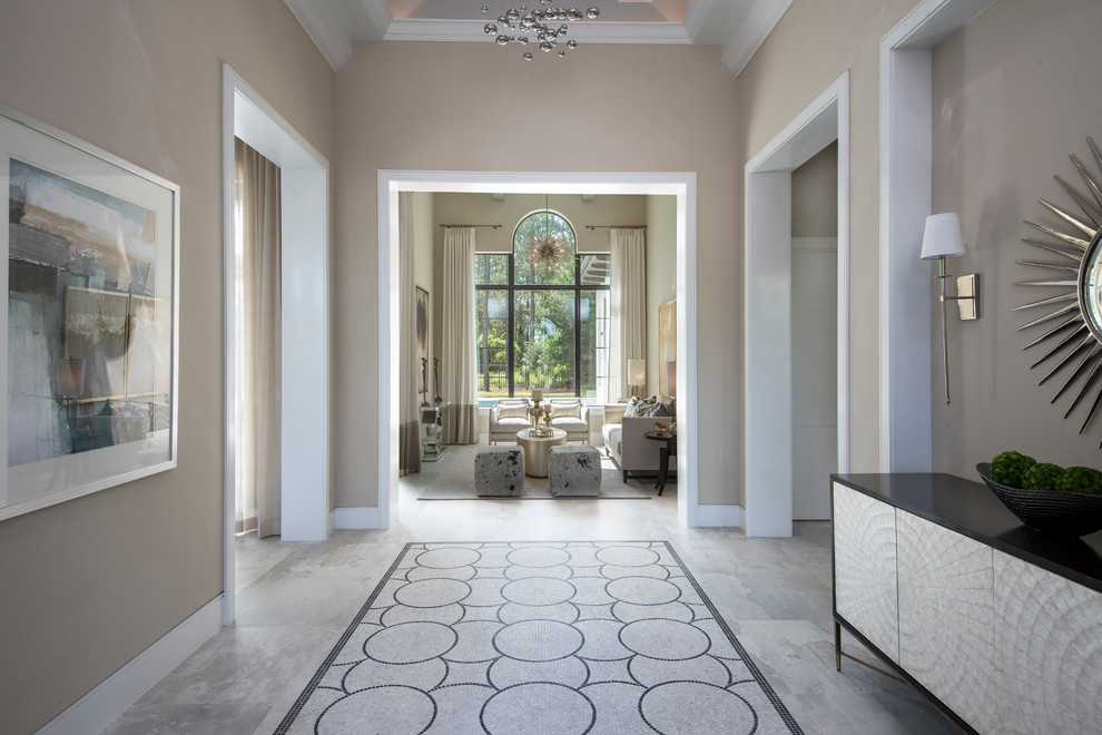 Photo of a large classic foyer in Orlando with porcelain flooring and grey floors.