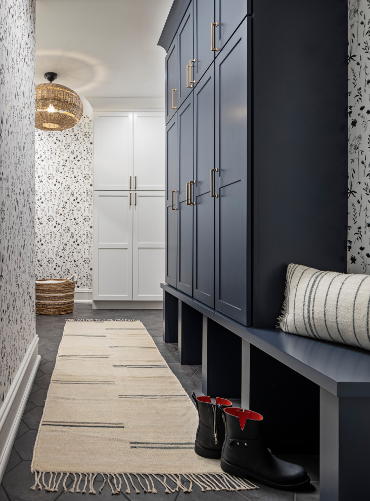 Example of a small classic porcelain tile, black floor and wallpaper mudroom design in Detroit