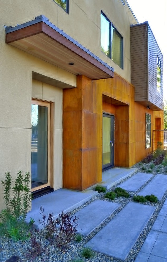 Design ideas for a contemporary entrance in Sacramento with a single front door and a glass front door.