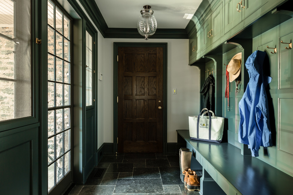 Inspiration for an eclectic marble floor mudroom remodel in New York