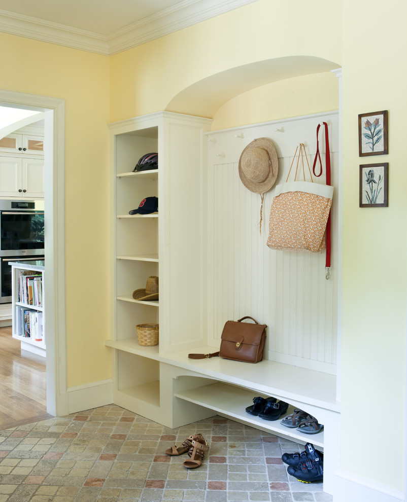 Inspiration for a timeless mudroom remodel in Boston
