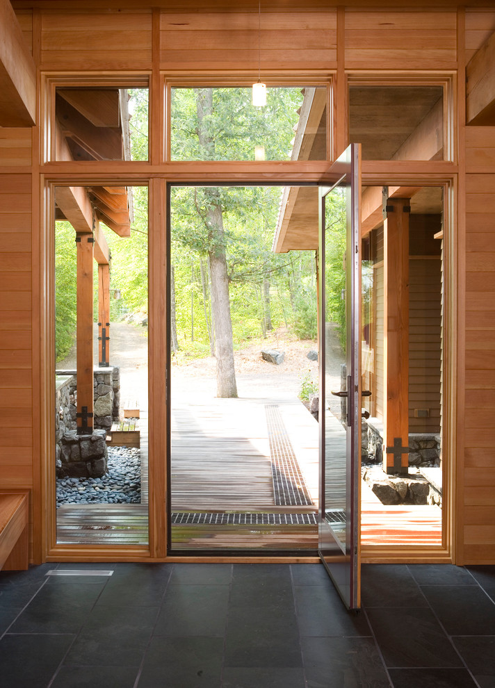 This is an example of a contemporary front door in Minneapolis with a glass front door.