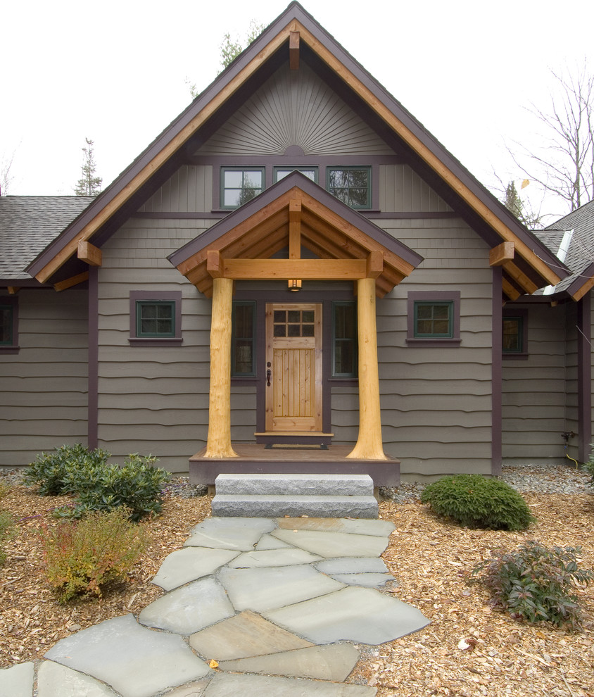 Design ideas for a large rustic front door in Boston with a single front door and a light wood front door.