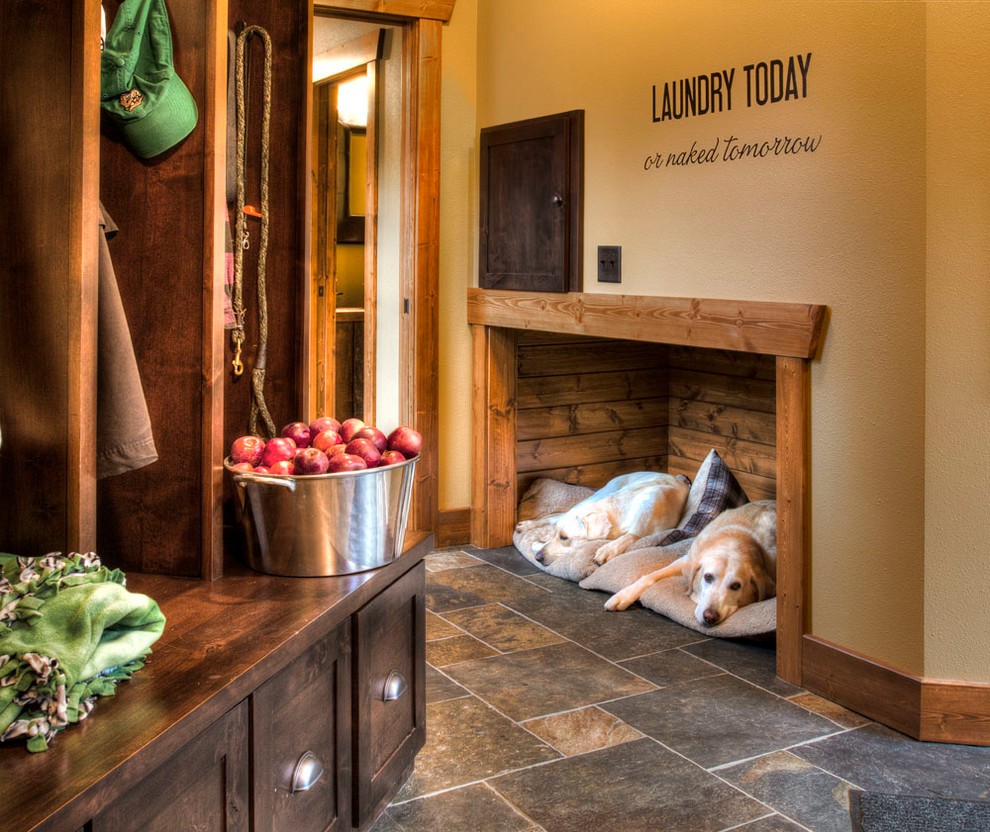 Mountain style mudroom photo in Minneapolis with beige walls