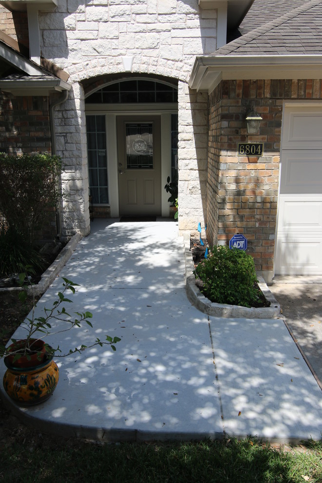 Inspiration for a medium sized classic front door in Austin with a single front door and a metal front door.