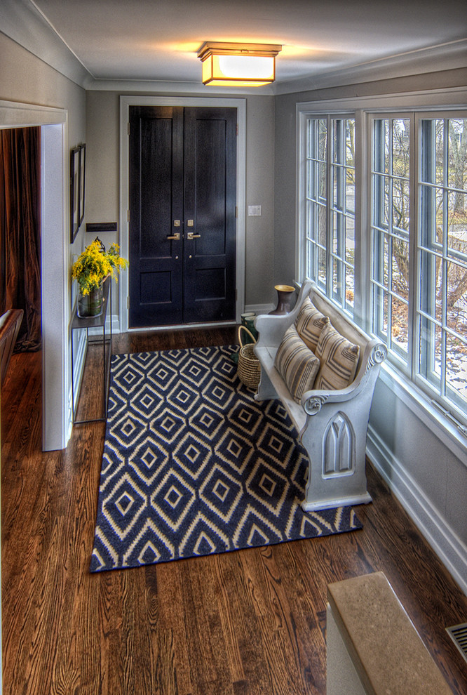 Elegant foyer photo in Chicago with gray walls