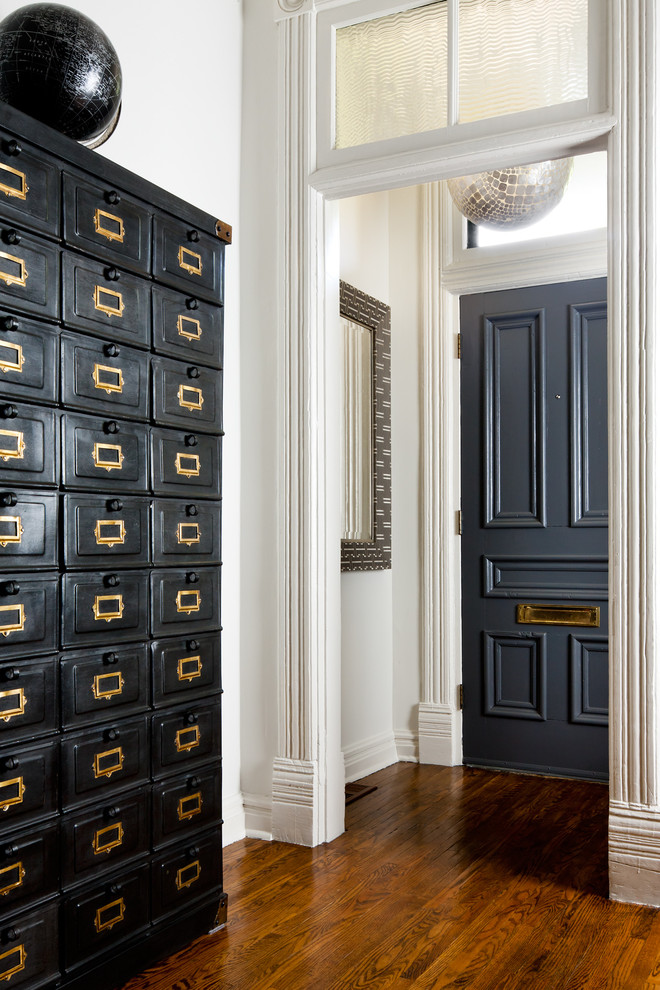 Ornate entryway photo in Toronto with white walls