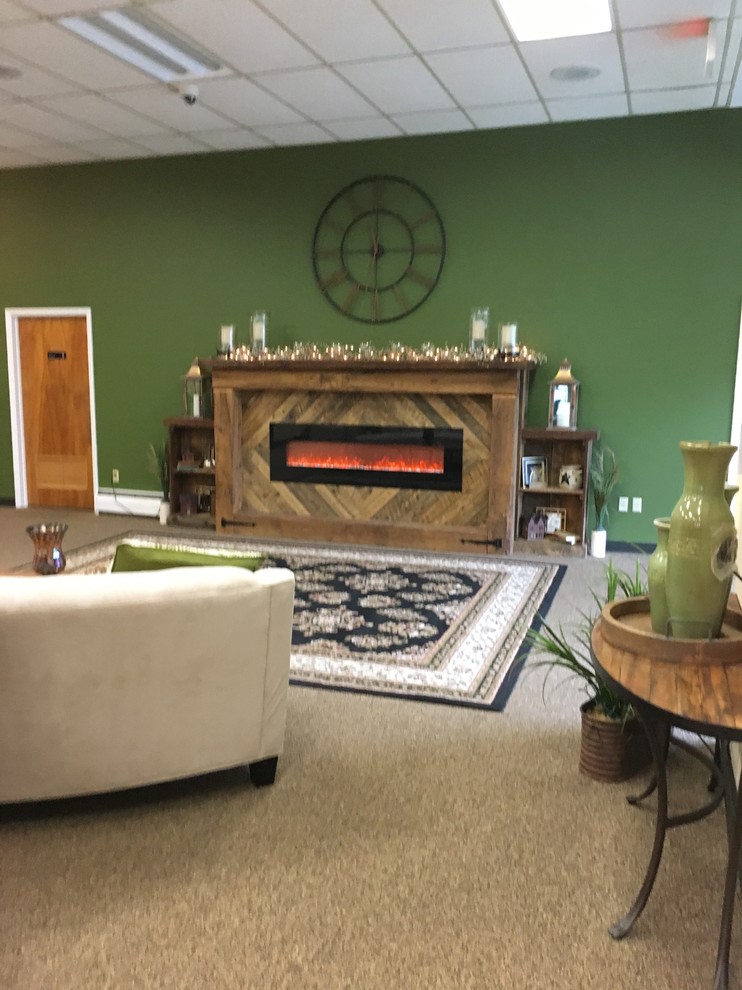 Inspiration for a huge rustic carpeted and beige floor entryway remodel in New York with green walls